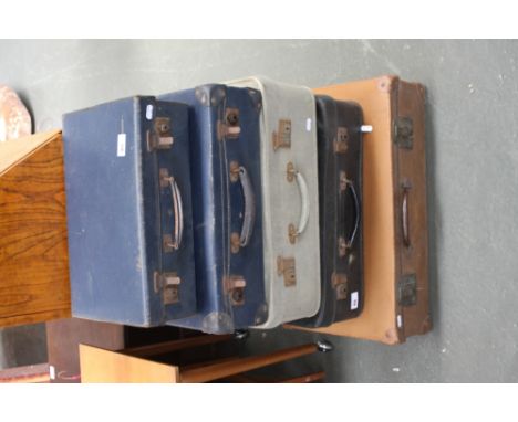 A number of vintage suitcases
