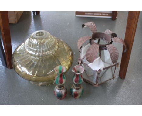 A selection of glass lamp shades to include two pink, green and clear glass oil lamp tops, a large oil lamp shade and another
