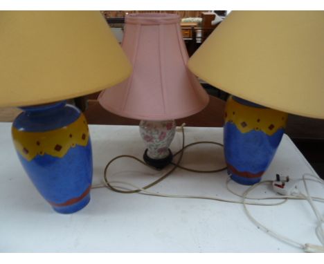 A pair of What's Vincent Cadeaux colourful bedside lamps with another floral lamp with pink shade (3)