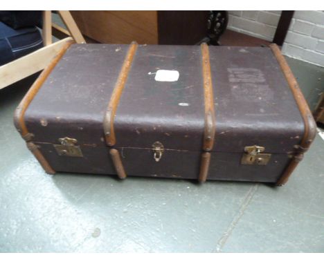 A vintage travel trunk with wood strappings and twin leather side handles 91cmW