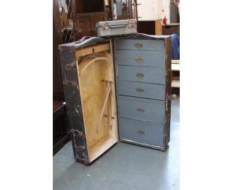 A vintage stud bound steamer trunk with wheels and internal compartment with a small suitcase 113 x 53 x 38cm