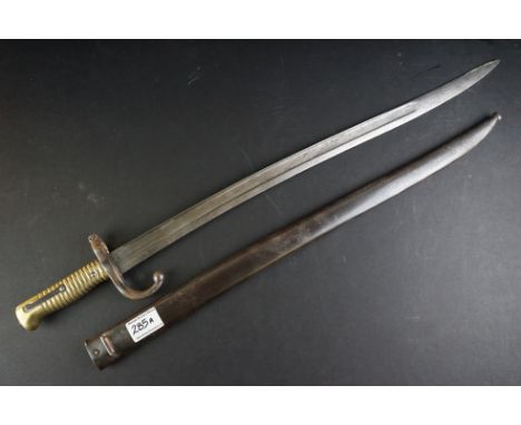 A French Model 1866 Chassepot Bayonet, Having A 57cm Yataghan Shaped Fullered Blade, The Hooked Quillon Numbered, With Ribbed