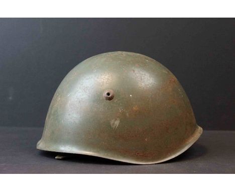 A World War Two Italian Army Steel Helmet Complete With Strap And Liner, Stamped B250 To The Inside. 