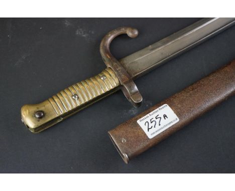 A French Model 1866 Chassepot Bayonet, Having A 57cm Yataghan Shaped Fullered Blade, The Hooked Quillon Numbered, With Ribbed