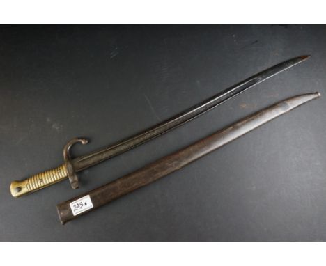 A French Model 1866 Chassepot Bayonet, Having A 57cm Yataghan Shaped Fullered Blade, The Hooked Quillon Numbered, With Ribbed