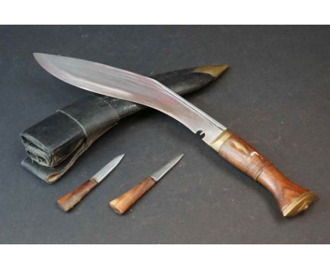 A Gurkha Kukri Knife With Steel Blade, Wooden Handle &amp; Brass Fittings, Complete With Original Scabbard And Tools. 