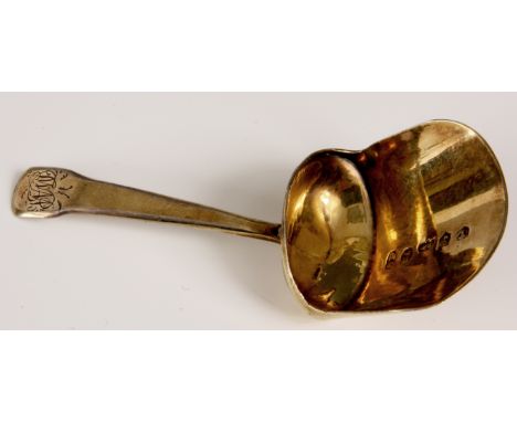 A GEORGE III SILVER GILT CADDY SCOOP with tapered monogrammed handle - Birmingham 1807 by Samuel Pemberton 7cm overall.