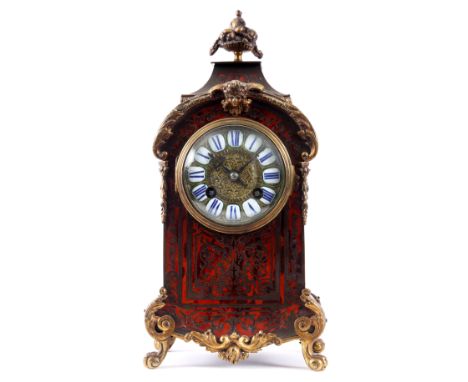 A LATE 19TH CENTURY FRENCH ORMOLU MOUNTED BRASS INLAID AND TORTOISESHELL MANTEL CLOCK with a 3.5" brass and enamel dial front