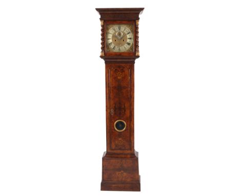 AN EARLY 18th CENTURY WALNUT AND MARQUETRY LONGCASE CLOCK the 12” square brass dial with engraved chapter ring and spandrels,