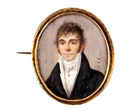 A LATE 18TH CENTURY MINIATURE PORTRAIT OF A GENTLEMAN finely painted on ivory and in a moulded gold metal frame 5cm high 4cm 