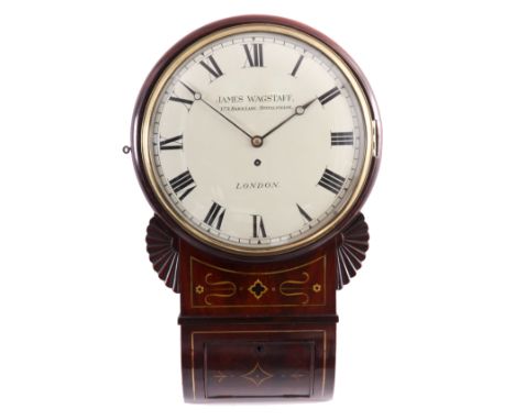 JAMES WAGSTAFF, LONDON   A REGENCY CONVEX DIAL WALL CLOCK the flamed mahogany case inlaid with brass having carved fan ears b