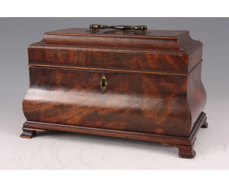 A LATE 18TH CENTURY FLAMED MAHOGANY BOMBÉ-SHAPED TEA CADDY with moulded hinged top fitted with a swan neck brass handle revea