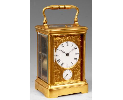 DROCOURT No. 14489  A LATE 19TH CENTURY GILT BRASS FRENCH REPEATING CANNELL CASED CARRIAGE CLOCK the folding handle above a m