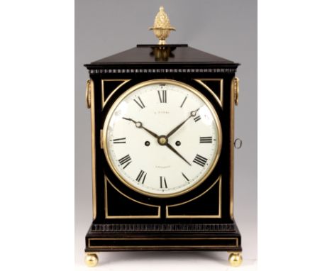 E. LOSEBY, LEICESTER  A REGENCY EBONISED BRACKET CLOCK the chamfer top case with gilt brass pineapple finial and inset corner