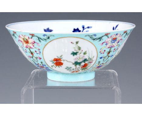 A CHINESE DAOGUANG PERIOD MEDALLION BOWL with turquoise coloured ground and fine scroll work and flower spray exterior enclos