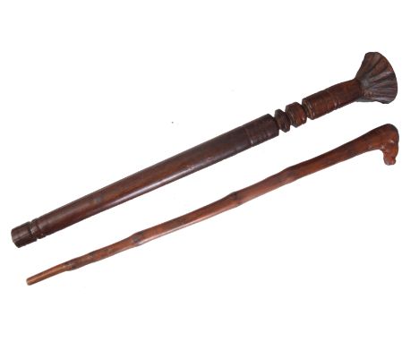 AN ANTIQUE AFRICAN HARDWOOD FIGHTING CLUB with turned shaft and notched head 79cm overall - along with a walking stick with r