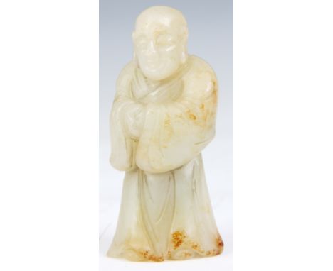 A CHINESE 18th CENTURY JADE PENDANT carved as a standing man 7cm high.