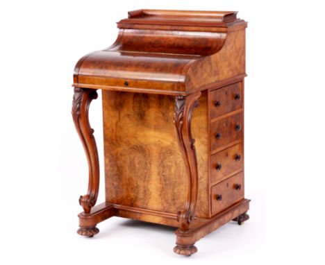 A VICTORIAN FIGURED BURR WALNUT PIANO-TOP DAVENPORT with fitted rising top above a leathered pull forward writing slide and f