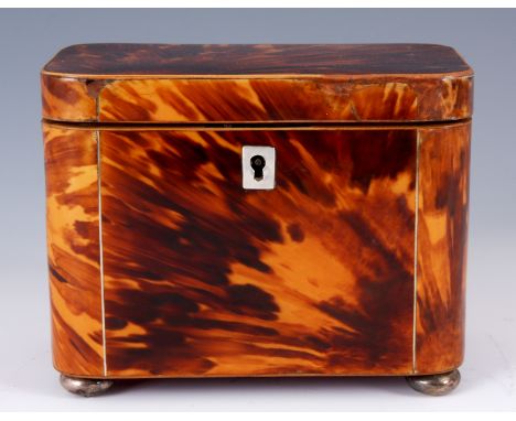 A 19TH CENTURY BONE STRUNG SHADED BLONDE TORTOISESHELL RECTANGULAR TEA CADDY with rounded corners and divided lidded interior
