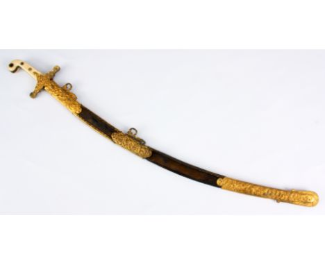 A 19th CENTURY PRESENTATION QUALITY GILT BRASS MOUNTED MAMELUKE SABRE having single edged curved blade with chased leaf work 