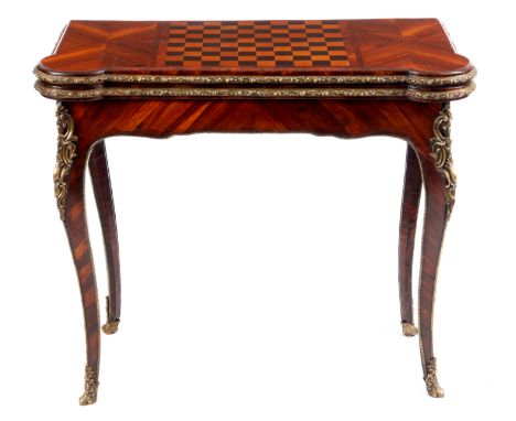 AN 18TH CENTURY FRENCH KINGWOOD AND ORMOLU MOUNTED FOLD OVER GAMES/CARD TABLE with segmented veneered chess board top and bai