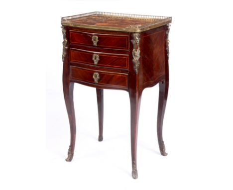 A LATE 18TH CENTURY FRENCH TULIPWOOD AND MARQUETRY LAMP TABLE with brass galleried floral marquetry top above three frieze dr
