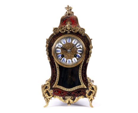 A SMALL LATE 19TH CENTURY FRENCH ORMOLU MOUNTED BRASS INLAID AND TORTOISESHELL BALLOON SHAPED MANTEL CLOCK with a 3.5" brass 