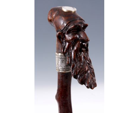 A 19TH CENTURY HAZEL WOOD GENTLEMANS WALKING STICK with sovereign holder and carved figure to the handle, inscribed Marshal. 