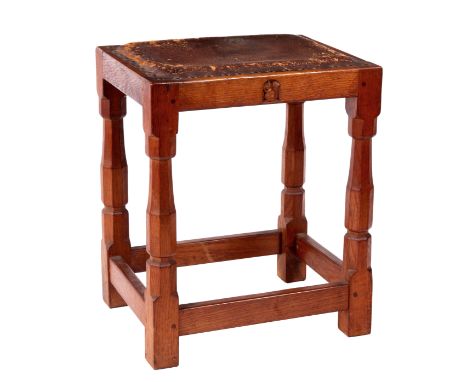 A WILF SQUIRREL MAN, HUTCHINSON JOINED OAK DRESSING TABLE STOOL with hide covered seat and faceted square section legs joined