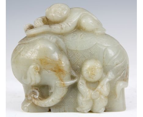 A 18TH CENTURY CHINESE CARVED JADE ELEPHANT WITH ATTENDANT FIGURES 8cm wide 7.5cm high.