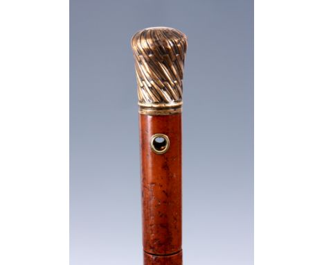 A MID 19TH CENTURY MALACCA SWORD STICK with gilt brass embossed handle, tassel hole and a finely etched gilt blade with the n