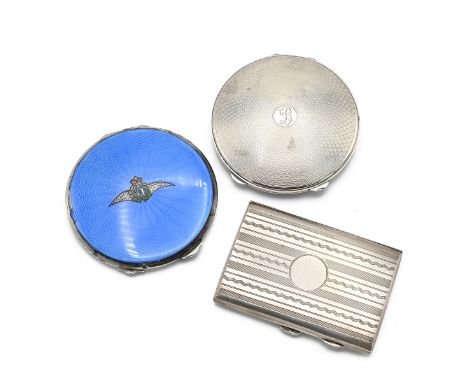 A silver and guilloche enamel R.A.F compact along with another silver compact and a silver case&nbsp;