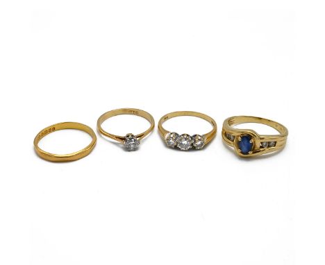 An 18ct gold three diamond ring, along with an 18ct gold dress ring, 18ct gold ring single stone diamond ring, 7.90 grams and