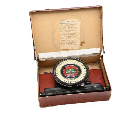 Boxed antique early toy typewriter. Simplex Special 1. US patent date 1902. Complete with its French labelled cardboard box.&