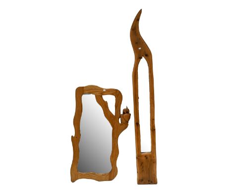 Two late 20th century carved oak framed mirrors - the first tall, slender, flame shape, H 178cm, W 21cm; the second with a ch