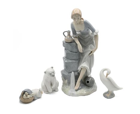 Collection of Lladro to include: Nao by Ladro model 02010115 - Girl by Fountain (height 34cm); seated Polar Bear model 100120