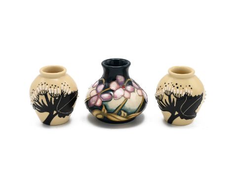 Moorcroft - three miniature vases. The first "Summer Rosette" by Kerry Goodwin, 2011. Height 6cm, diameter 6.5. Also a Pair o