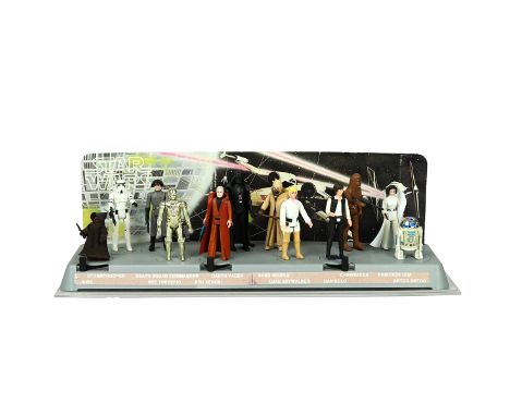 Vintage 1978 Kenner Star Wars mail-away First 12 Figure Stand with figures and back card. Each retains their weapons as appro