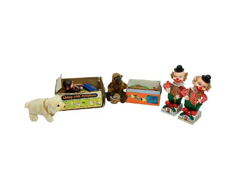 A collection of mixed toys/models to include two models of Mr Bob The Violinist, drumming monkey, Chimp with xylophone, polar