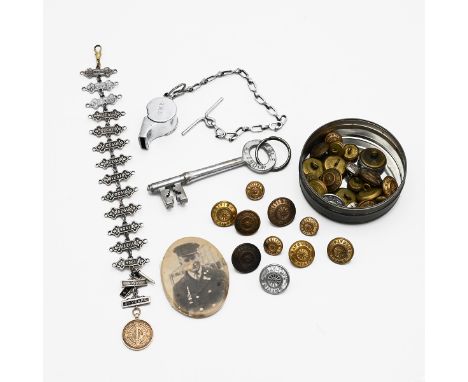 A GWR whistle, goods van key, photo, along with 13 Silver Year Service Badge, plus Silver 20,25 and 30 year service badges, a