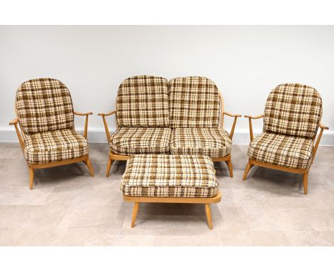 Ercol blonde beechwood suite, in the Windsor range, comprising two-seater sofa, two armchairs and a footstool all with cream 