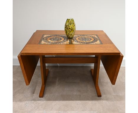 Mid Century Teak dining table by Gangsgo Mobler, Denmark, with inlaid geometric ceramic tiles within the top and the side fla