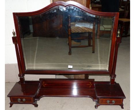 An Edwardian mahogany framed bevelled glass dressing table mirror with easel stand, having inlaid decoration and fitted 2 dra