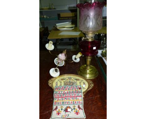 A 19th century Brass oil lamp, a small sampler, light fitting and dressing table tray