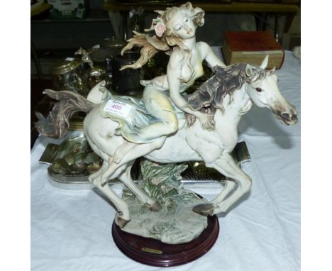 A limited edition resin sculpture of a girl on a horse by Giuseppe Armani, with certificate; a 19th century coloured print; a