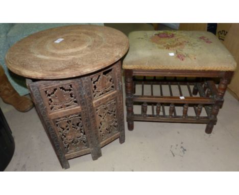 A Middle Eastern carved hardwood occasional table with circular top; an Edwardian music stool with galleried undertier and ne