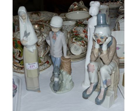 A Nao figure:  boy with dog; 2 similar figures:  seated clown and girl with rabbit; a Spode figure:  Henrietta