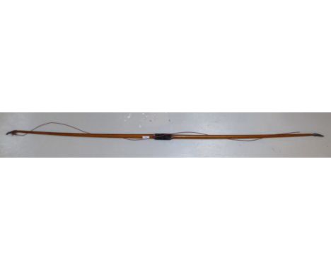 A vintage yew wood bow, 73"