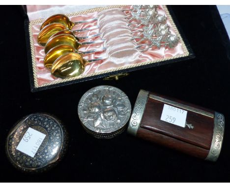 A set of Finnish coffee spoons, cased; a niello snuff box; 2 others