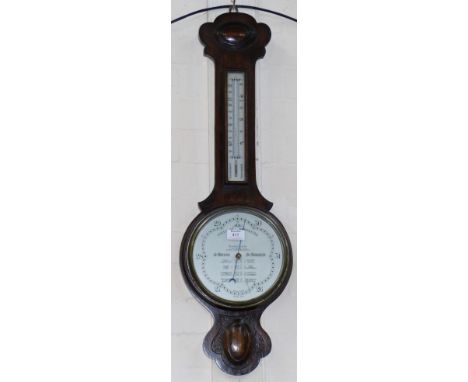 An early 20th century oak banjo barometer with thermometer